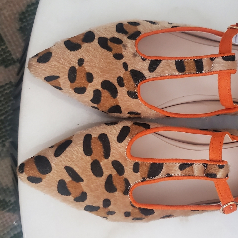 Trendy Boutique Animal Print Flats with Vibrant Orange Accents
